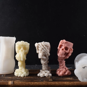 Detailed view of 3D Halloween skull and rose silicone mold for candle making diy craft