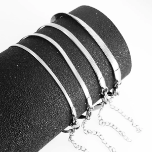 Set of four silver stainless steel snake bone chain necklaces in various thicknesses