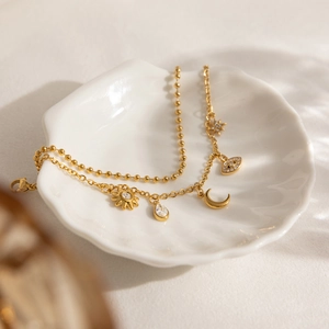 Bracelet double couche en acier plaqué or 18K avec breloques lune œil et zircon blanc