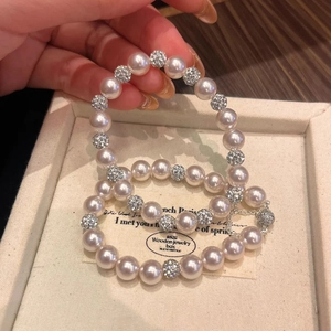 Elegant beaded pearl bracelet with rhinestone spheres and French vintage style design