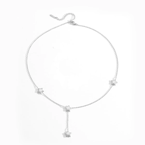 Detailed view of silver star pendant necklace with adjustable chain and lobster clasp