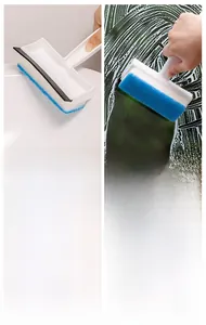 Close-up of 2-in-1 bathroom cleaning brush with blue sponge head and black rubber squeegee