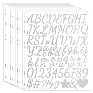 Stack of silver glitter alphabet and number stickers for DIY graduation cap decor