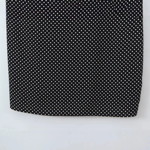 French style lace polka dot slip dress in black and white with detailed fabric texture