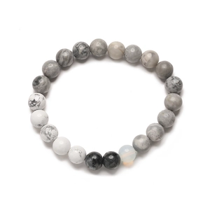 Detailed view of the universe planet natural stone beads bracelet on white background