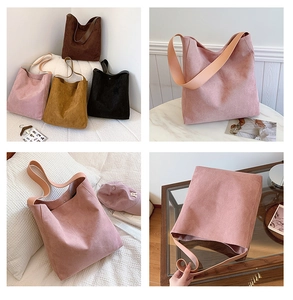 Dettaglio borse shopper vintage in camoscio nei colori rosa, marrone e nero
