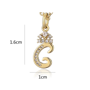 Macro view of 18K gold plated crown letter C pendant with dimensions 1.6cm by 1cm