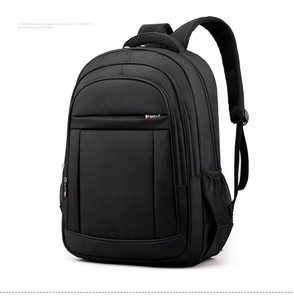 Detail of black business backpack featuring multi-layer zippers and mesh side pockets