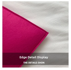 Close-up of pink felt heart handbag showing detailed stitching and soft fiber texture