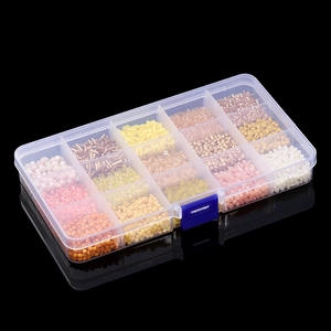 Detailed view of 15-compartment organizer box with colorful glass seed beads for DIY jewelry