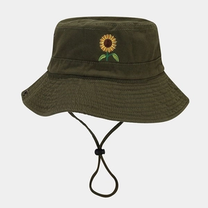 Detail of sunflower embroidery on olive green cotton bucket hat with adjustable wind strap