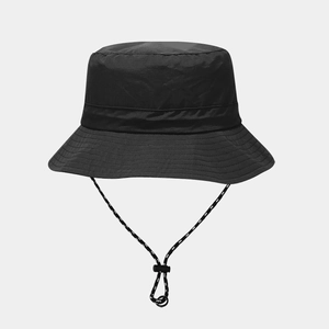 Detail of waterproof bucket hat with adjustable black and white woven windproof cord