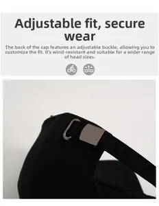 Detail of adjustable metal buckle and elastic strap on the back of the black baseball cap