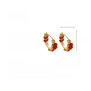 Detail view of gold wheat-ear U-shaped hoop earrings with crystals and 2cm size specs