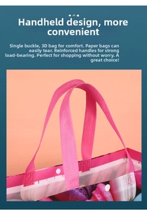 Close-up of pink non-woven tote bag showing reinforced handles and secure snap button