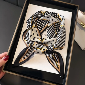 Polka dot and geometric stripe silk scarf with Magazin logo in a premium gift box