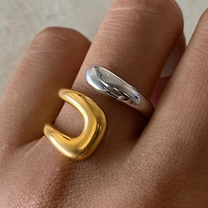 Polished 18k gold and silver stainless steel open rings in a modern U-shape design