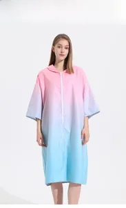 Detailed front view of pink and blue gradient hooded quick-dry beach robe with white zipper