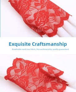 Close-up of red lace fingerless sun protection gloves with floral rose patterns