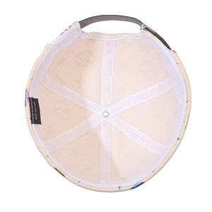 Detailed interior view of a beige 100% cotton brimless docker hat with visible stitching