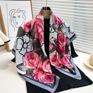 Elegant silk scarf with pink rose floral print and contrasting geometric border trim