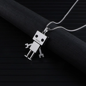 Detailed view of a polished silver hip-hop robot necklace with movable limbs on a black stand