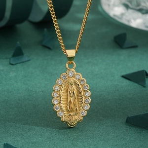 Golden Virgin Mary oval pendant necklace with sparkling cubic zirconia border