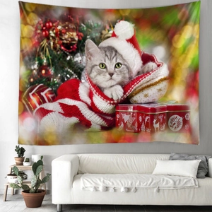 Christmas wall tapestry featuring a cute cat in a stocking over a modern white sofa