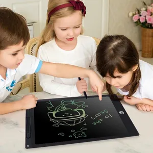 Kids LCD writing tablet with stylus featuring pressure sensitive screen and doodle graphics