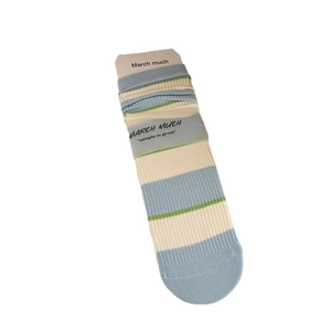Striped mid-calf cotton socks in light blue and beige with green ribbed knit texture