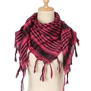 Close-up of houndstooth desert tactical scarf in rose red and black with tassel detail