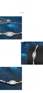 Close-up of moissanite bracelet with four-prong setting and polished 925 silver finish