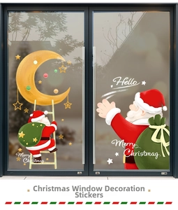 Detail of Santa Claus on moon static window stickers for festive shop glass door decor
