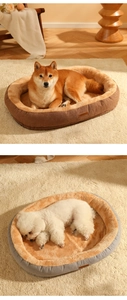 Detail showing the plush interior and brand leather logo of the warm oval pet bed