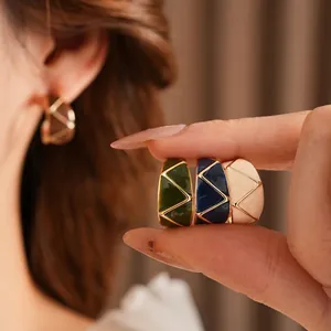 Vintage enamel C-shaped earrings with gold geometric patterns in green and blue