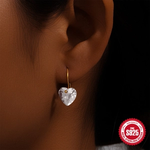 Elegant S925 sterling silver heart-shaped drop earrings with sparkling clear crystals