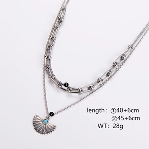 Silver layered fan pendant necklace with turquoise stone and dual-chain length detail