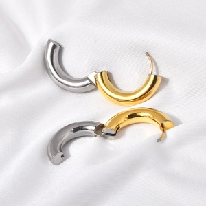 Polished two-tone gold and silver titanium steel C-shaped hoop earrings for women