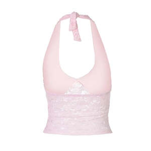 Close-up of pink lace halter top featuring intricate floral textures and V-neckline detail