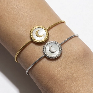 Fashionable moon design white shell bracelet in gold and silver finish with snake chain