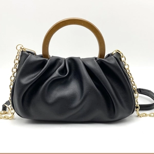 Elegant black pleated cloud bag featuring retro wooden handle and gold chain strap