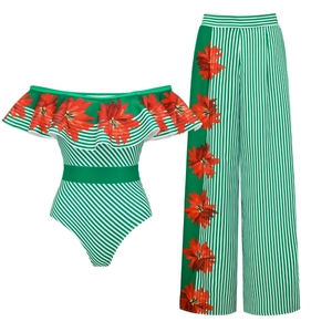 Off-shoulder ruffled top and wide-leg pants with green stripes and red floral prints