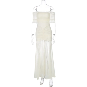 Detailed view of the layered cream mesh fabric and pleated design on this off-shoulder dress