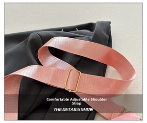 Detail of pink nylon shoulder strap with adjustable gold metal buckle for crossbody bag