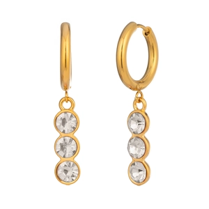 Detail of gold earrings with three round white zircons and a secure clasp closure