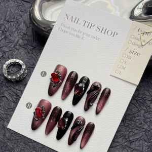 Gothic 3D snake pattern stiletto press-on nails in deep ruby cat-eye and black finish