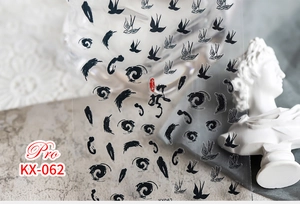 Artistic ink style nail stickers with black swallow patterns, model KX-062 close-up