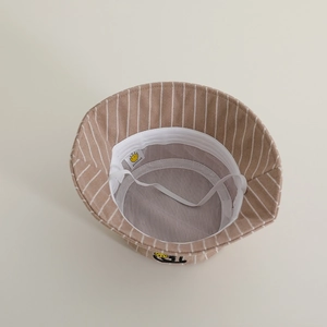 Detail of khaki striped wool sun hat for kids with interior lining and windproof strap