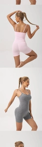Detailed knit texture of pink and grey seamless yoga rompers with thin straps