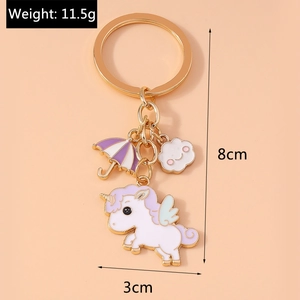 Detail view of unicorn keychain with umbrella and cloud charms featuring product dimensions